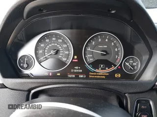 2015 BMW 4 Series 428i with VIN WBA4A9C52FGL85228, listed as a IAAI auction lot 41228043 with 152,729 mi miles and . Bid and sale history available at DreamBid. Image 7.