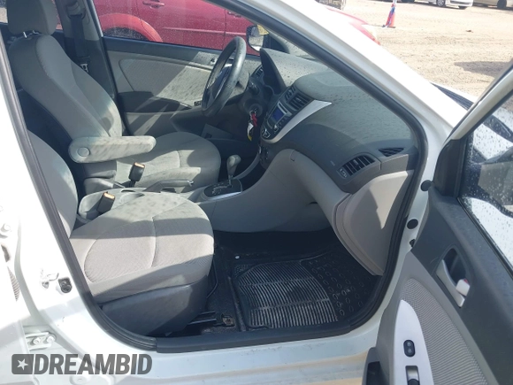 2014 Hyundai Accent GS with VIN KMHCT5AE6EU157751, listed as a IAAI auction lot 42161112 with 145,653 mi miles. Bid and sale history available at carsss.com. Image 5.