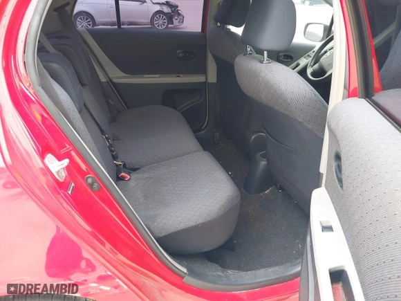 2009 Toyota Yaris with VIN JTDKT903295244022, listed as a IAAI auction lot 41615570 with 165,964 mi miles. Bid and sale history available at carsss.com. Image 8.