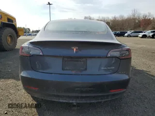 2022 Tesla Model 3 Long Range with VIN 5YJ3E1EB3NF275515, listed as a Copart auction lot 52566515 with 55,980 mi miles and Salvage Title. Bid and sale history available at carsss.com. Image 6.