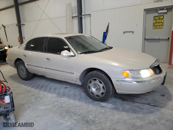2002 Lincoln Continental with VIN 1LNHM97VX2Y694578, listed as a Copart auction lot 42245705 with 195,236 mi miles and Salvage Title. Bid and sale history available at carsss.com. Image 4.
