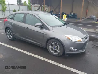 2014 Ford Focus SE with VIN 1FADP3K21EL462169, listed as a IAAI auction lot 42145524 with 100,156 mi miles. Bid and sale history available at carsss.com. Image 1.