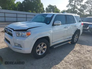 2011 Toyota 4Runner SR5 with VIN JTEZU5JR2B5014781, listed as a IAAI auction lot 42231932 with 124,646 mi miles and . Bid and sale history available at DreamBid. Image 2.