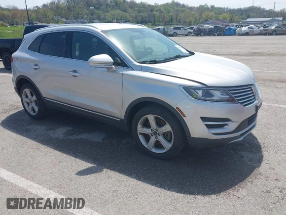2015 Lincoln MKC with VIN 5LMCJ2A94FUJ16038, listed as a IAAI auction lot 42057400 with 102,848 mi miles. Bid and sale history available at carsss.com. Image 1.