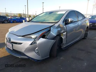2017 Toyota Prius Two with VIN JTDKARFU3H3049806, listed as a IAAI auction lot 41811825 with 94,453 mi miles. Bid and sale history available at carsss.com. Image 2.
