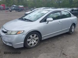 2010 Honda Civic LX with VIN 2HGFA1F59AH323381, listed as a IAAI auction lot 42181040 with 320,419 mi miles and . Bid and sale history available at DreamBid. Image 2.
