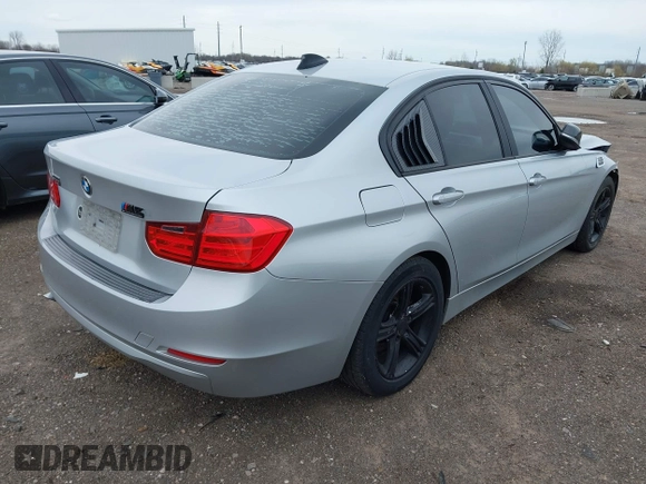 2014 BMW 3 Series 320i xDrive with VIN WBA3C3C58EP661364, listed as a IAAI auction lot 41947049 with 211,982 mi miles and . Bid and sale history available at DreamBid. Image 4.