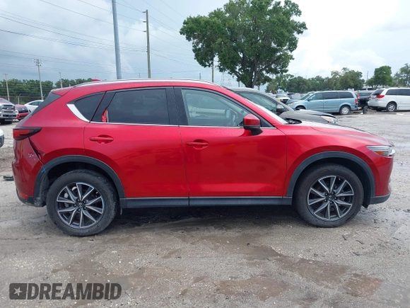 2018 Mazda CX-5 Grand Touring with VIN JM3KFADM5J0437365, listed as a IAAI auction lot 42657919 with 96,760 mi miles and . Bid and sale history available at DreamBid. Image 13.