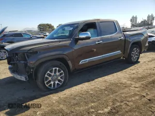 2022 Toyota Tundra 1794 Edition with VIN 5TFMA5DB6NX002129, listed as a Copart auction lot 87030874 with 71,585 mi miles and Salvage title. Bid and sale history available at DreamBid. Image 1.