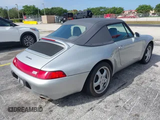 1998 Porsche 911 Carrera with VIN WP0CA2992WS340996, listed as a IAAI auction lot 42002177 with 47,222 mi miles. Bid and sale history available at carsss.com. Image 4.