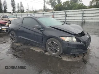 2015 Honda CR-Z with VIN JHMZF1D40FS003453, listed as a Copart auction lot 42036005 with 60,971 mi miles and Salvage Title. Bid and sale history available at carsss.com. Image 4.
