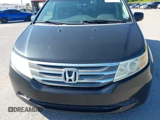 2011 Honda Odyssey EX-L with VIN 5FNRL5H66BB058333, listed as a IAAI auction lot 42172045 with 215,723 mi miles and . Bid and sale history available at carsss.com. Image 6.