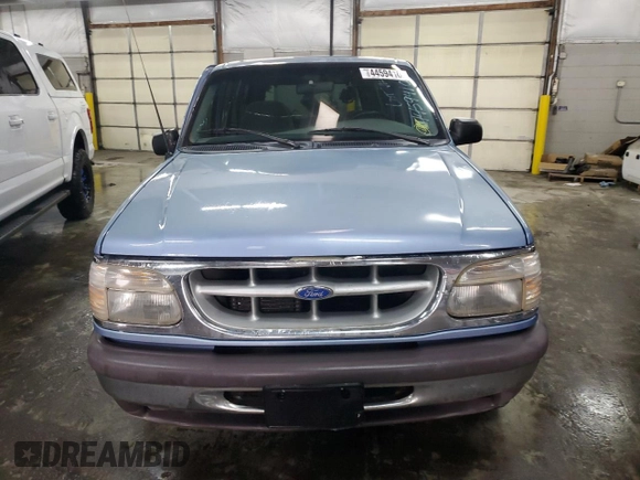 1997 Ford Explorer XLT with VIN 1FMDU35P8VZB98855, listed as a Copart auction lot 44594105 with 210,155 mi miles and Salvage title. Bid and sale history available at DreamBid. Image 5.