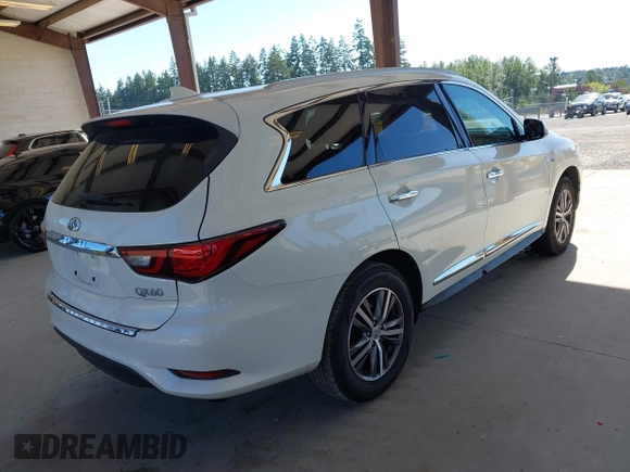 2020 Infiniti QX60 Luxe with VIN 5N1DL0MM4LC507648, listed as a IAAI auction lot 42640168 with 52,981 mi miles and . Bid and sale history available at DreamBid. Image 4.