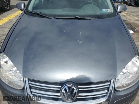2009 Volkswagen Jetta SE with VIN 3VWRZ71K79M168084, listed as a Copart auction lot 57854825 with 150,986 mi miles and Salvage title. Bid and sale history available at DreamBid. Image 11.
