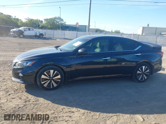2019 Nissan Altima 2.5 SV with VIN 1N4BL4DV9KC117080, listed as a IAAI auction lot 41827686 with 84,228 mi miles. Bid and sale history available at carsss.com. Image 14.