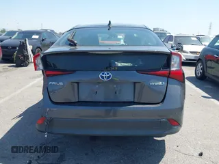 2020 Toyota Prius L Eco z VIN JTDKARFU3L3111990, wystawiony jako IAAI lot #41964834 z przebiegiem 67 873 mil mil oraz . Historia ofert i sprzedaży dostępna na DreamBid. Obrazek 16.