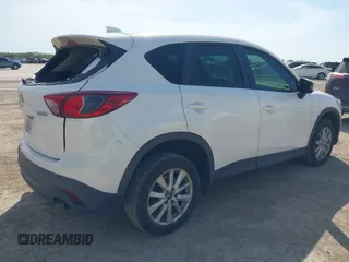 2013 Mazda CX-5 Sport z VIN JM3KE2BE5D0135213, wystawiony jako IAAI lot #42270730 z przebiegiem 140 917 mil mil oraz . Historia ofert i sprzedaży dostępna na DreamBid. Obrazek 4.