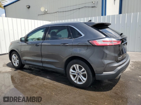 2020 Ford Edge SEL с VIN 2FMPK4J95LBB17293, выставлен на аукционе Copart как лот 58796255 с пробегом 82 583 миль миль и Чистый • Clean title. История ставок и продаж доступна на DreamBid. Изображение 2.