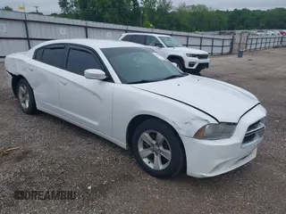 2014 Dodge Charger SE with VIN 2C3CDXBG5EH277920, listed as a IAAI auction lot 42109354 with 146,615 mi miles and . Bid and sale history available at carsss.com. Image 1.