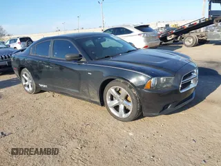 2014 Dodge Charger SXT with VIN 2C3CDXHG2EH369350, listed as a IAAI auction lot 41657478 with 120,566 mi miles. Bid and sale history available at carsss.com. Image 1.