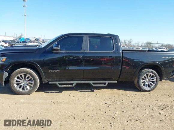 2022 Ram 1500 Laramie with VIN 1C6SRFRT7NN180979, listed as a IAAI auction lot 41824340 with 32,446 mi miles and . Bid and sale history available at DreamBid. Image 14.