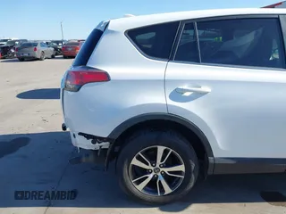 2018 Toyota RAV4 XLE z VIN 2T3WFREV3JW483398, wystawiony jako IAAI lot #41740776 z przebiegiem 70 640 mil mil oraz . Historia ofert i sprzedaży dostępna na DreamBid. Obrazek 19.