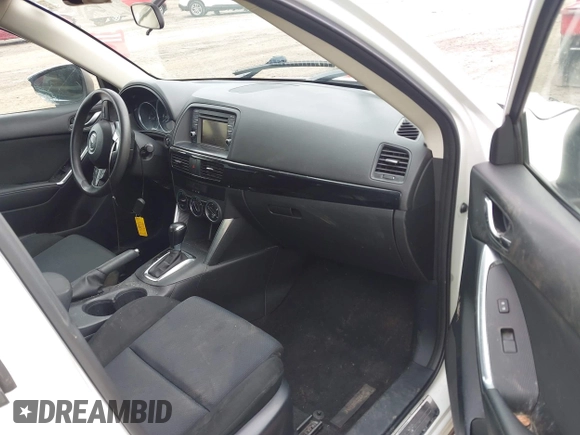 2014 Mazda CX-5 Sport with VIN JM3KE2BE8E0422322, listed as a IAAI auction lot 42009499 with 166,966 mi miles and . Bid and sale history available at carsss.com. Image 5.