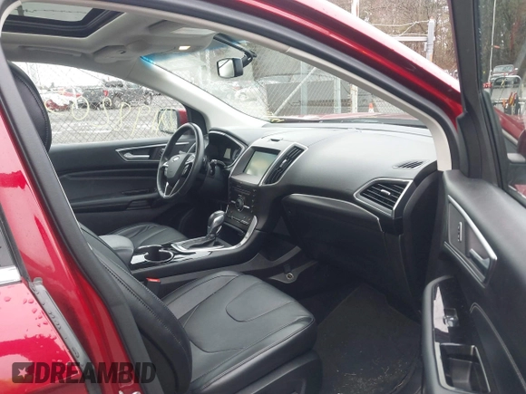 2015 Ford Edge Titanium z VIN 2FMTK4K94FBB69970, wystawiony jako IAAI lot #41982057 z przebiegiem 97 422 mil mil oraz . Historia ofert i sprzedaży dostępna na DreamBid. Obrazek 5.