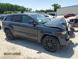 2018 Jeep Grand Cherokee Altitude with VIN 1C4RJFAGXJC267021, listed as a Copart auction lot 58762945 with 93,347 mi miles and Salvage title. Bid and sale history available at DreamBid. Image 4.