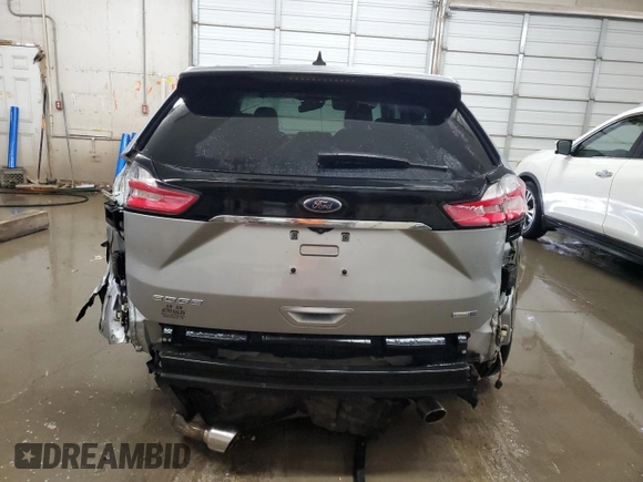 2020 Ford Edge SE z VIN 2FMPK4G9XLBA07766, wystawiony jako Copart lot #56852365 z przebiegiem 151 664 mil mil oraz Szkoda całkowita • Salvage title. Historia ofert i sprzedaży dostępna na DreamBid. Obrazek 6.