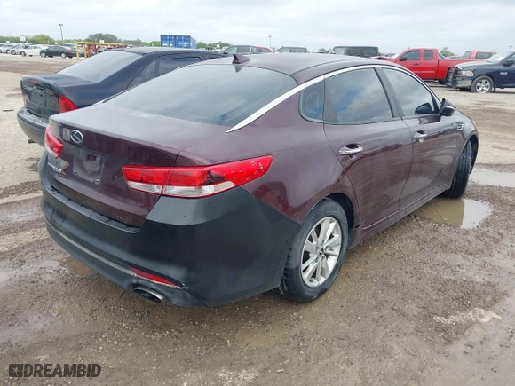 2016 Kia Optima LX with VIN 5XXGT4L3XGG027430, listed as a IAAI auction lot 41940146 with 75,456 mi miles. Bid and sale history available at carsss.com. Image 4.