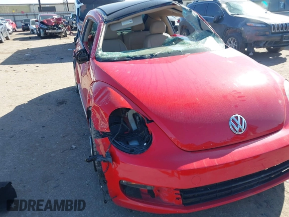 2013 Volkswagen Beetle 2.5L w/Sun/Sound/Nav with VIN 3VWJX7AT0DM673162, listed as a IAAI auction lot 41336320 with Not Provided miles and . Bid and sale history available at DreamBid. Image 1.