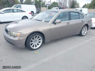 2004 BMW 7 Series 745Li with VIN WBAGN63494DS45716, listed as a IAAI auction lot 41906522 with 127,292 mi miles. Bid and sale history available at carsss.com. Image 2.
