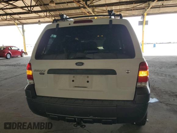 2006 Ford Escape XLT with VIN 1FMYU03166KA73605, listed as a Copart auction lot 71968524 with 143,742 mi miles and Salvage Title. Bid and sale history available at carsss.com. Image 6.