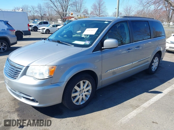 2013 Chrysler Town & Country Touring with VIN 2C4RC1BG9DR777819, listed as a IAAI auction lot 41824692 with 138,702 mi miles. Bid and sale history available at carsss.com. Image 2.