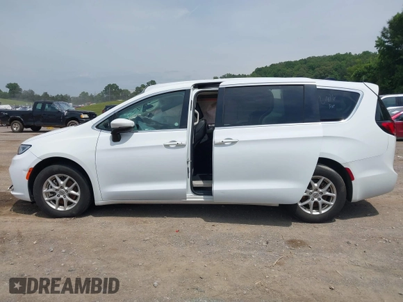 2023 Chrysler Pacifica Touring L with VIN 2C4RC1BGXPR531396, listed as a IAAI auction lot 42492340 with Not provided miles and . Bid and sale history available at DreamBid. Image 14.