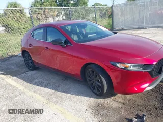 2024 Mazda 3 S Select Sport with VIN JM1BPAKM1R1712874, listed as a IAAI auction lot 42692875 with 27,747 mi miles and . Bid and sale history available at DreamBid. Image 1.