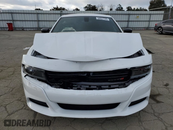 2023 Dodge Charger SXT with VIN 2C3CDXBG5PH703978, listed as a Copart auction lot 50657745 with 7,198 mi miles and Salvage Title. Bid and sale history available at carsss.com. Image 5.