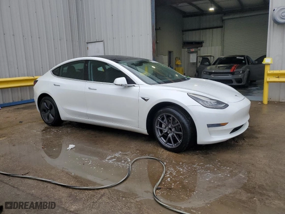 2019 Tesla Model 3 Mid Range with VIN 5YJ3E1EA7KF317543, listed as a Copart auction lot 83594454 with 58,550 mi miles and Non Repairable. Bid and sale history available at carsss.com. Image 4.