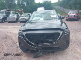 2022 Mazda CX-9 Touring Plus with VIN JM3TCBAY2N0611876, listed as a IAAI auction lot 42369073 with 37,639 mi miles and . Bid and sale history available at DreamBid. Image 12.