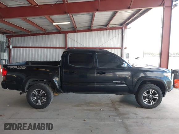 2016 Toyota Tacoma SR with VIN 5TFCZ5AN8GX020900, listed as a IAAI auction lot 41911329 with 133,931 mi miles. Bid and sale history available at carsss.com. Image 13.