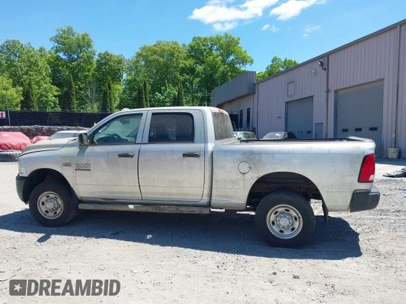 2014 Ram 2500 Tradesman z VIN 3C6TR5CT7EG186099, wystawiony jako IAAI lot #42317585 z przebiegiem 309 687 mil mil oraz . Historia ofert i sprzedaży dostępna na DreamBid. Obrazek 14.