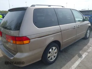 2003 Honda Odyssey EX with VIN 5FNRL186X3B031520, listed as a IAAI auction lot 42095955 with 142,566 mi miles and . Bid and sale history available at DreamBid. Image 4.