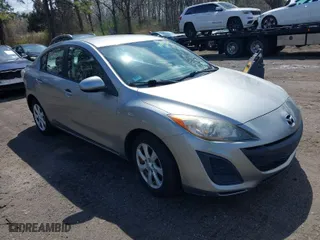 2010 Mazda Mazda3 i Touring with VIN JM1BL1SG5A1349036, listed as a IAAI auction lot 42038645 with 115,944 mi miles. Bid and sale history available at carsss.com. Image 1.