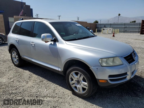 2005 Volkswagen Touareg z VIN WVGCM77L95D014940, wystawiony jako Copart lot #60156795 z przebiegiem 114 551 mil mil oraz Czysty tytuł • Clean title. Historia ofert i sprzedaży dostępna na DreamBid. Obrazek 4.
