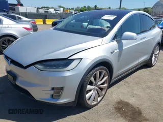 2016 Tesla Model X P90D with VIN 5YJXCAE49GF001067, listed as a IAAI auction lot 41980455 with 94,746 mi miles. Bid and sale history available at carsss.com. Image 2.