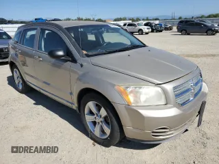 2010 Dodge Caliber SXT z VIN 1B3CB4HA7AD571525, wystawiony jako Copart lot #61651405 z przebiegiem 188 383 mil mil oraz Czysty tytuł • Clean title. Historia ofert i sprzedaży dostępna na DreamBid. Obrazek 4.