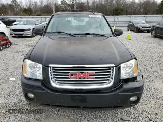 2006 GMC Envoy SLT with VIN 1GKDS13SX62354690, listed as a Copart auction lot 84138814 with 194,669 mi miles and Salvage Title. Bid and sale history available at carsss.com. Image 5.