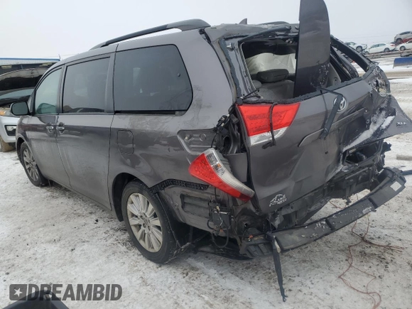 2014 Toyota Sienna Ltd with VIN 5TDDK3DC9ES078041, listed as a Copart auction lot 45488115 with 134,480 mi miles and Salvage Title. Bid and sale history available at carsss.com. Image 2.